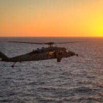 PACIFIC OCEAN (Dec. 3, 2016) An MH-60S Sea Hawk helicopter, from Helicopter Sea Combat Squadron (HSC) 8, prepares to land on the flight deck of the aircraft carrier USS Nimitz (CVN 68). Nimitz is currently underway conducting Tailored Ship's Training Availability and Final Evaluation Problem (TSTA/FEP), which evaluates the crew on their performance during training drills and real-world scenarios. Once Nimitz completes TSTA/FEP they will begin Board of Inspection and Survey (INSURV) and Composite Training Unit Exercise (COMPTUEX) in preparation for an upcoming 2017 deployment. (U.S. Navy photo by Seaman David Claypool/Released)