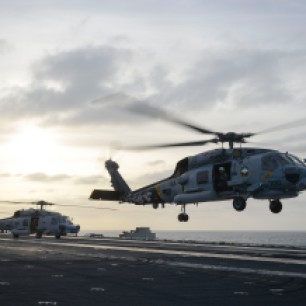 PACIFIC OCEAN (Dec. 6, 2016) - An MH-60R Sea Hawk helicopter from the Wolf Pack of Helicopter Maritime Strike Squadron (HSM) 75 lifts off the flight deck of the aircraft carrier USS Nimitz (CVN 68). Nimitz is currently underway conducting Tailored Ship's Training Availability and Final Evaluation Problem (TSTA/FEP), which evaluates the crew on their performance during training drills and real-world scenarios. Once Nimitz completes TSTA/FEP they will begin Board of Inspection and Survey (INSURV) and Composite Training Unit Exercise (COMPTUEX) in preparation for an upcoming 2017 deployment. (U.S. Navy photo by Petty Officer 3rd Class Samuel Bacon/Released)