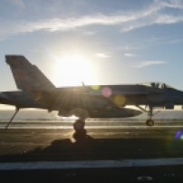 PACIFIC OCEAN (Dec. 7, 2016) - An F/A-18E Super Hornet from the Argonauts of Strike Fighter Squadron (VFA) 147 performs a touch and go on the flight deck of the aircraft carrier USS Nimitz (CVN 68). Nimitz is currently underway conducting Tailored Ship's Training Availability and Final Evaluation Problem (TSTA/FEP), which evaluates the crew on their performance during training drills and real-world scenarios. Once Nimitz completes TSTA/FEP they will begin Board of Inspection and Survey (INSURV) and Composite Training Unit Exercise (COMPTUEX) in preparation for an upcoming 2017 deployment. (U.S. Navy photo by Petty Officer 3rd Class Samuel Bacon/Released)